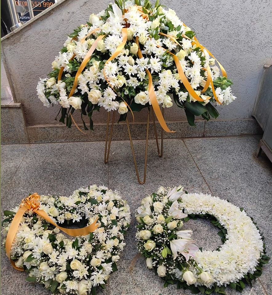 Graceful farewell wreath arrangements  — flowers delivered in Nairobi by Floral Whispers Gifts