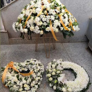 Graceful farewell wreath arrangements — flowers delivered in Nairobi by Floral Whispers Gifts